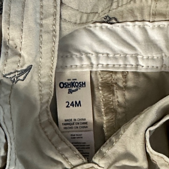 OshKosh B'gosh Kids Tan Overalls w/ embroidered paper airplane design - Picture 2 of 5